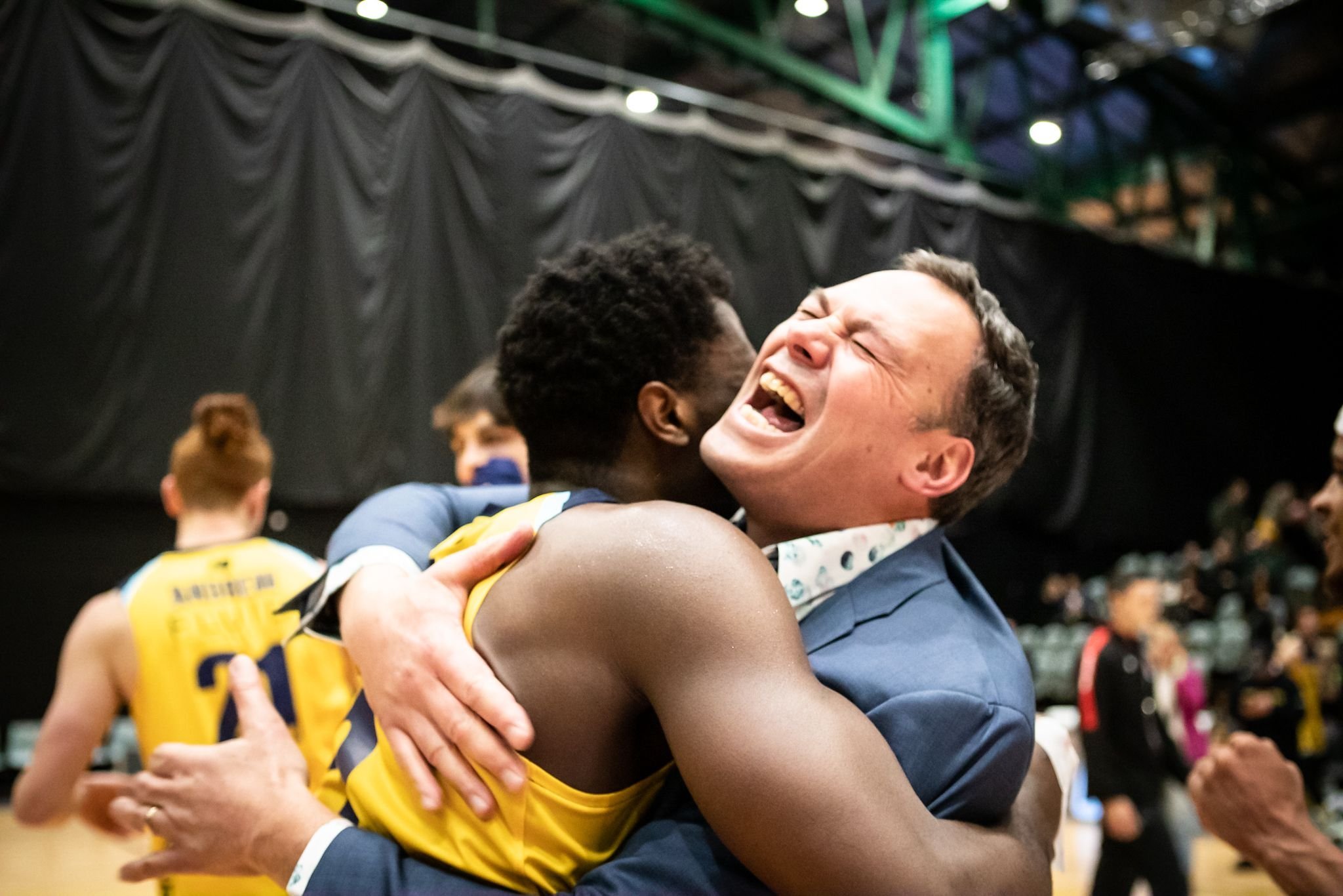 Otago Nuggets coach Brent Matehaere celebrates with shooting guard Keith Williams after the...