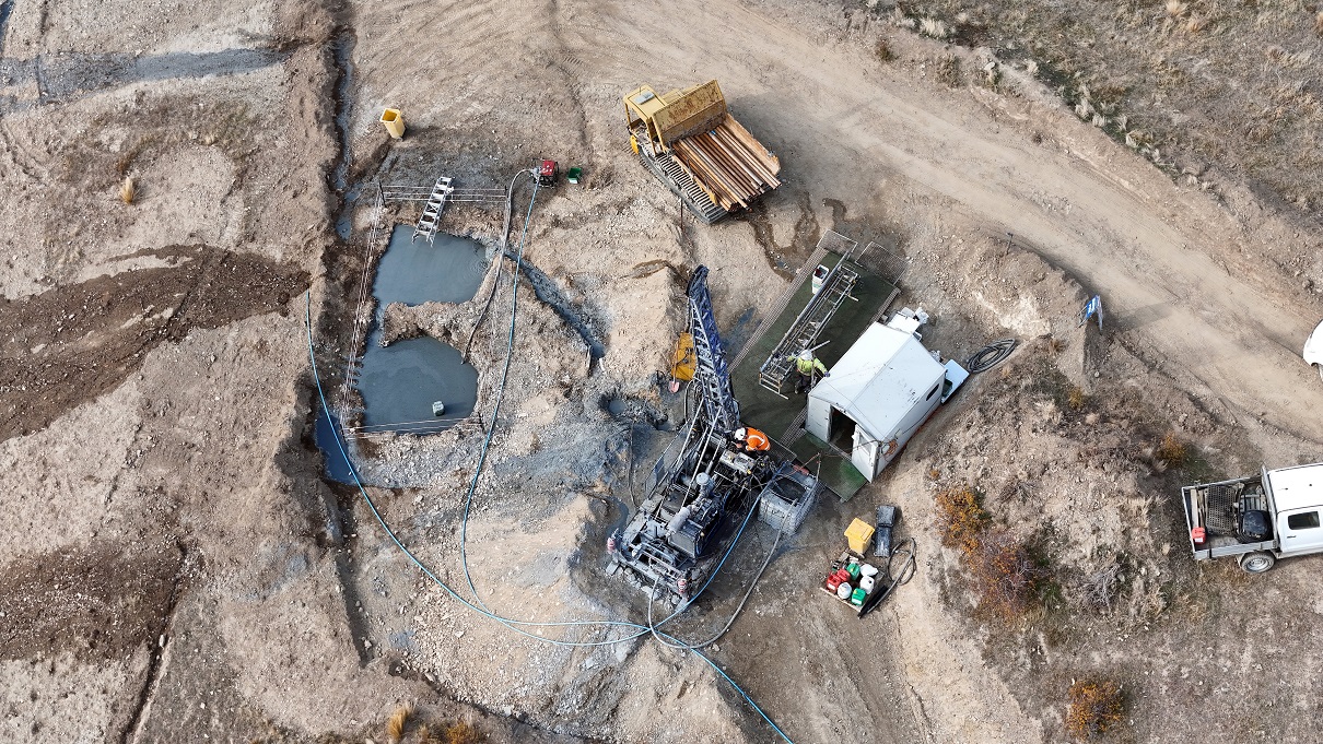 An aerial view of a drilling rig at the Rise and Shine deposit, atop the Rise and Shine ridge,...