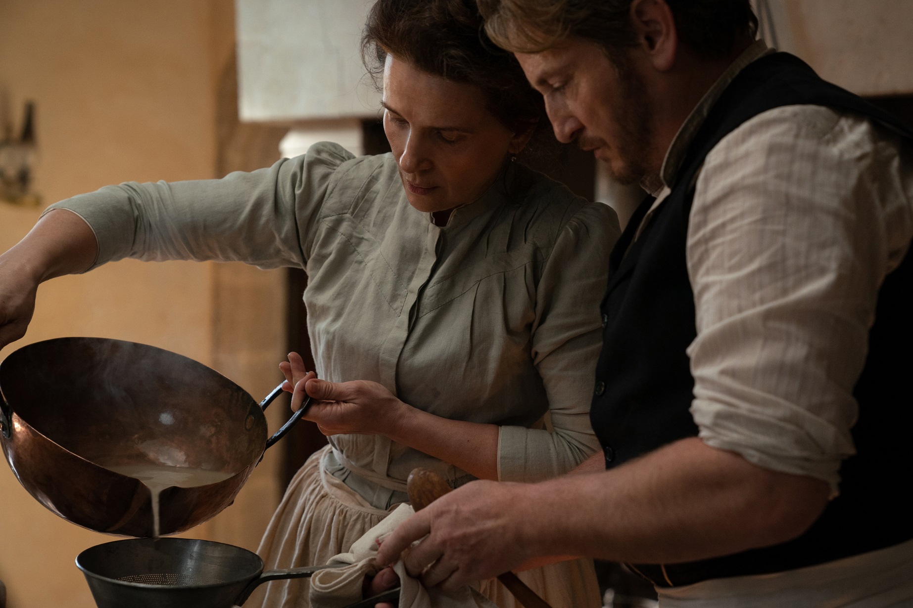 Juliette Binoche and Benoit Magimel in The Taste of Things.