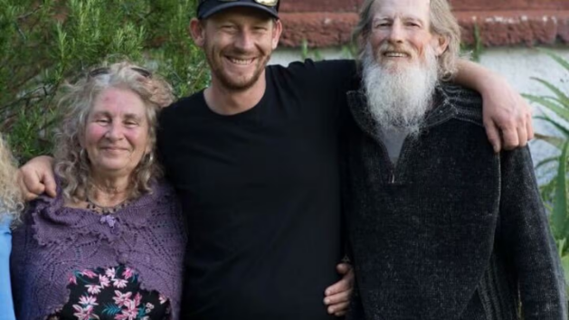 Joshua Terrey pictured with his mother, Lyn Hartnett, and father, Peter Terrey. The three people...