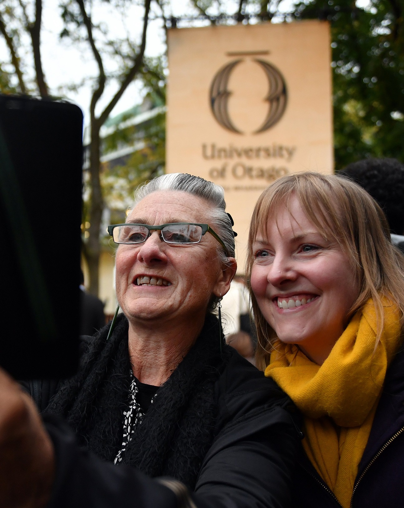 University of Otago staff members Tui Kent (left) and Lisa Kremer take a selfie after the...