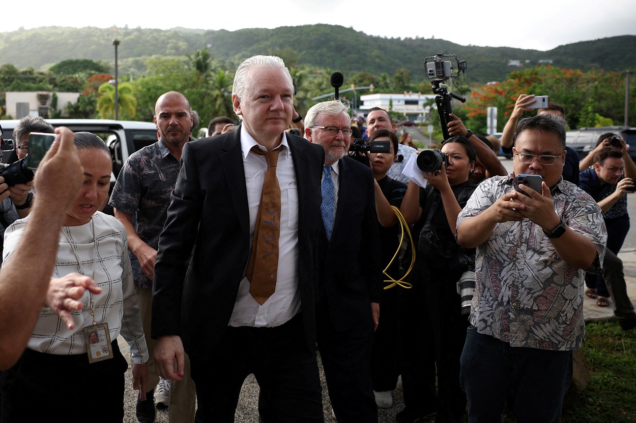 Julian Assange arrives at a United States District Court in Saipan, Northern Mariana Islands....