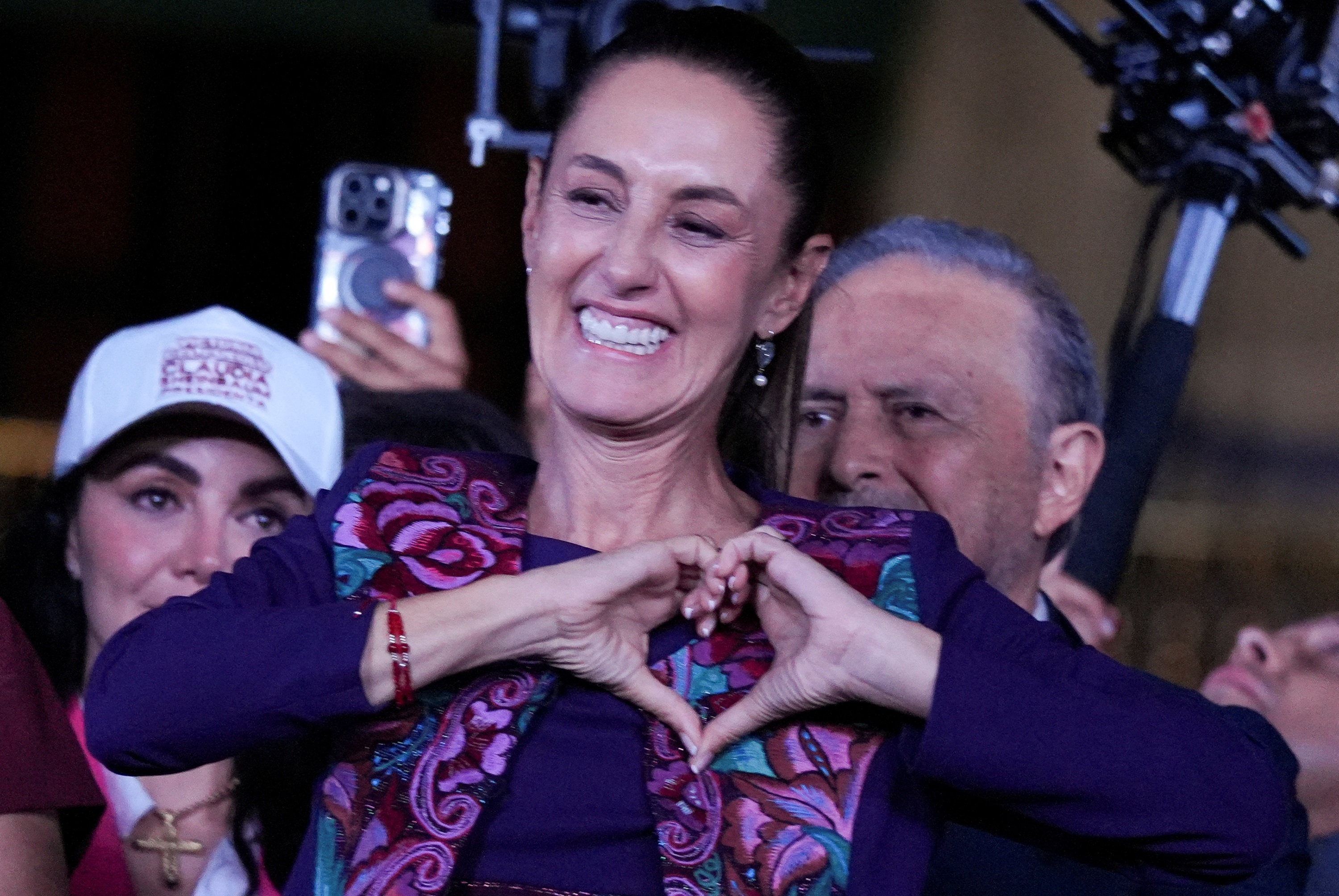 Claudia Sheinbaum gestures to supporters in Mexico City after winning the presidential election....