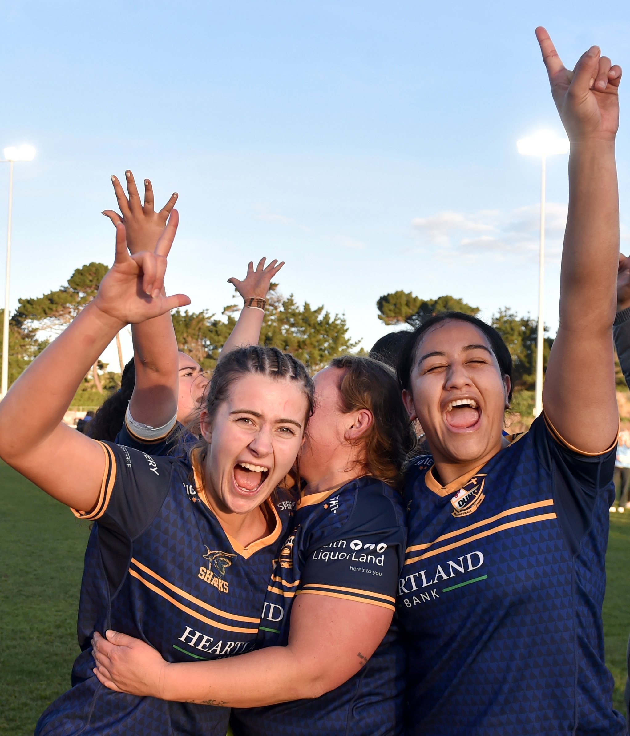 Dunedin players (from left) Grace Guyton-Voyce, Erin Adams and Amoe Wharehinga celebrate their win.