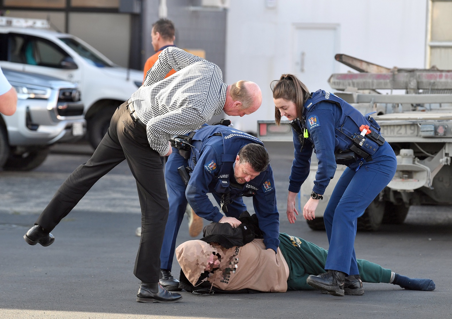 Police, with the help of a member of the public, arrest a man in Andersons Bay Rd in relation to...