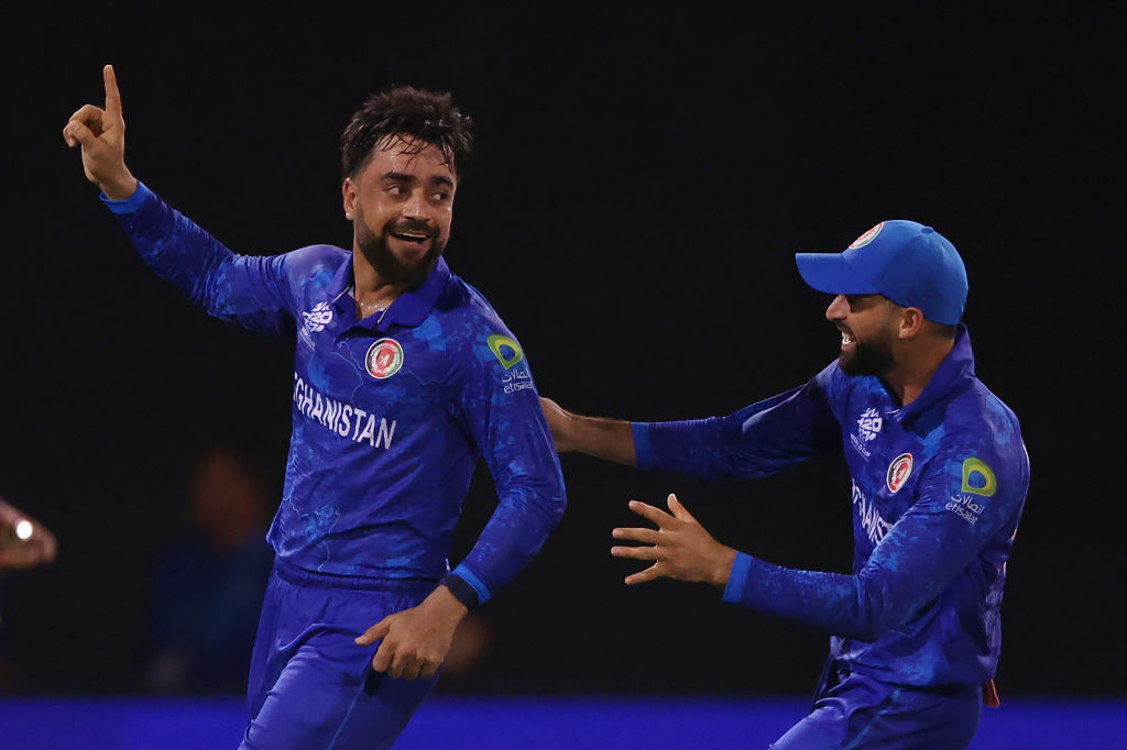 Afghanistan's Rashid Khan celebrates after dismissing New Zealand's Michael Bracewell. Photo: Getty