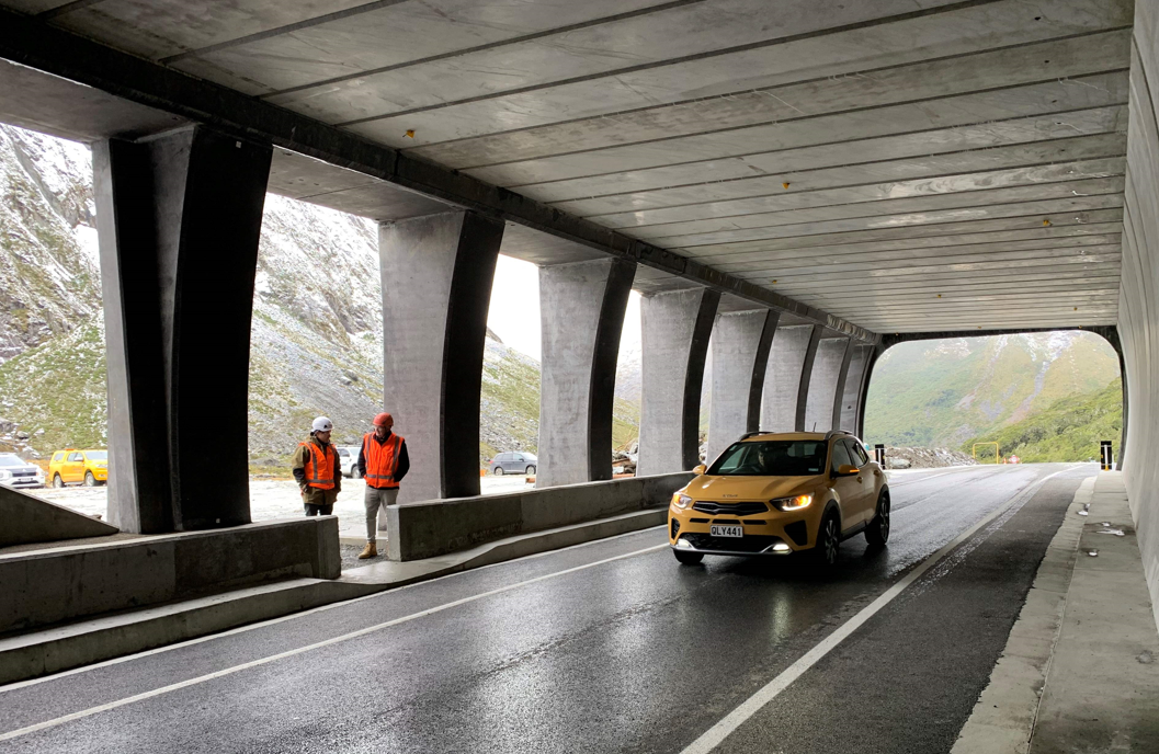 The freshly asphalted surface inside the new entrance to the Homer Tunnel on the Te Anau side is...