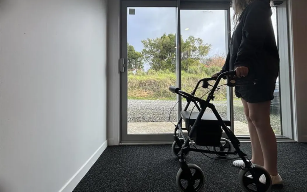 Claudia is learning to walk again after overdosing on nitrous oxide. Photo: Rayssa Almeida/RNZ