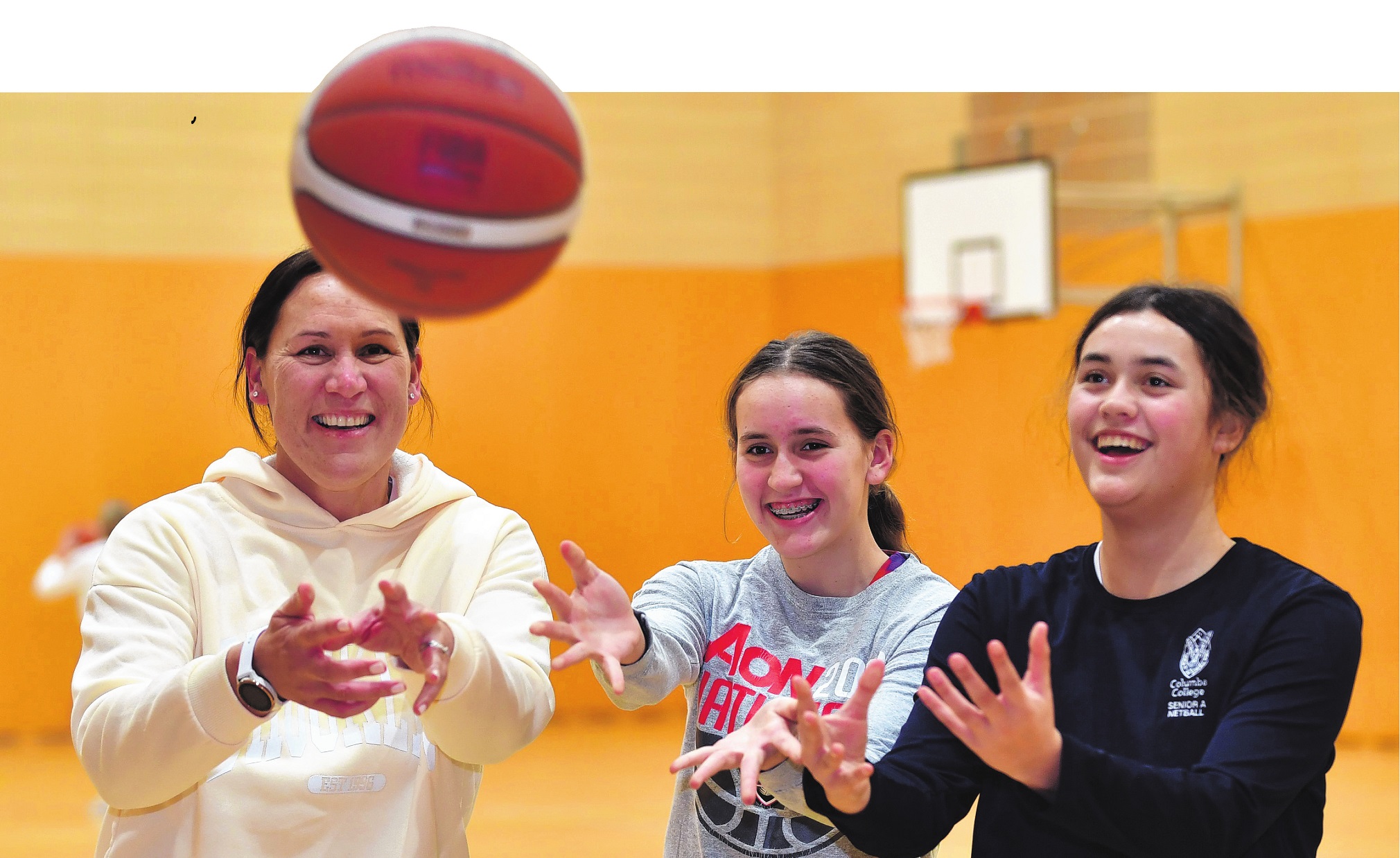 Jodi Brown has been playing club basketball with her daughters, Aria, 13 (left), and Kiana, 15....