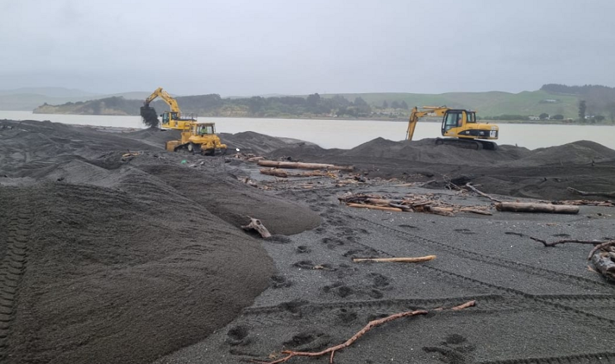 Heavy machinery is being used to clear the Wairoa river mouth. Photo: Hawkes Bay Regional Council