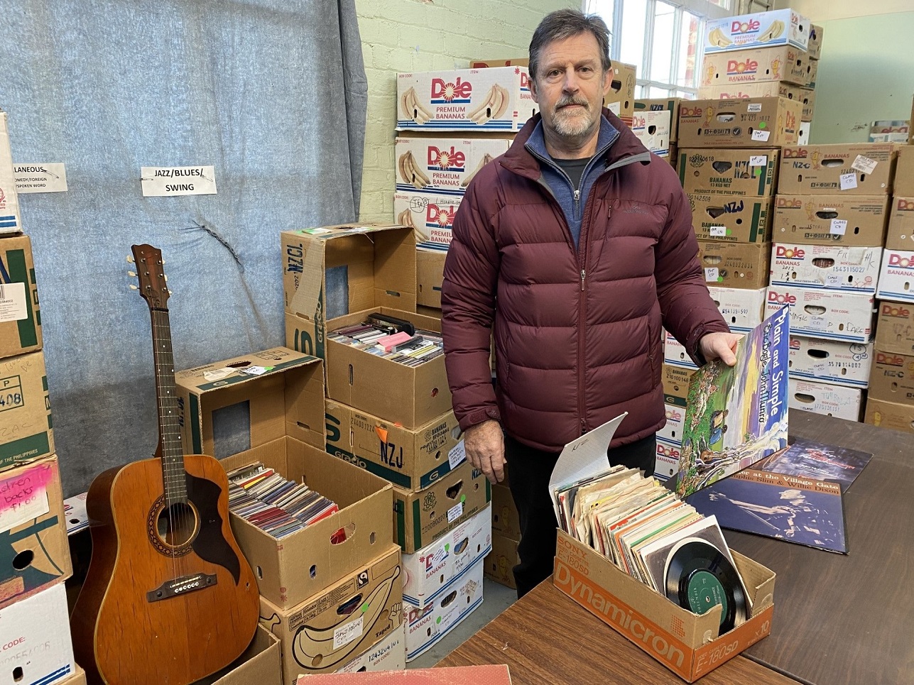 Regent Theatre Music & Entertainment Sale co-ordinator Mark Burrows shows some of the tens of...