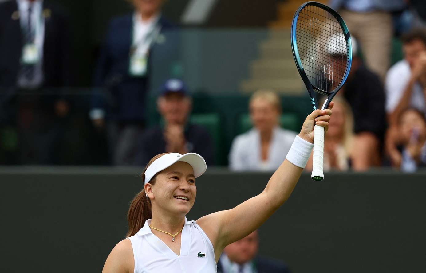 New Zealand's Lulu Sun celebrates winning her first round Wimbledon match against China's Qinwen...
