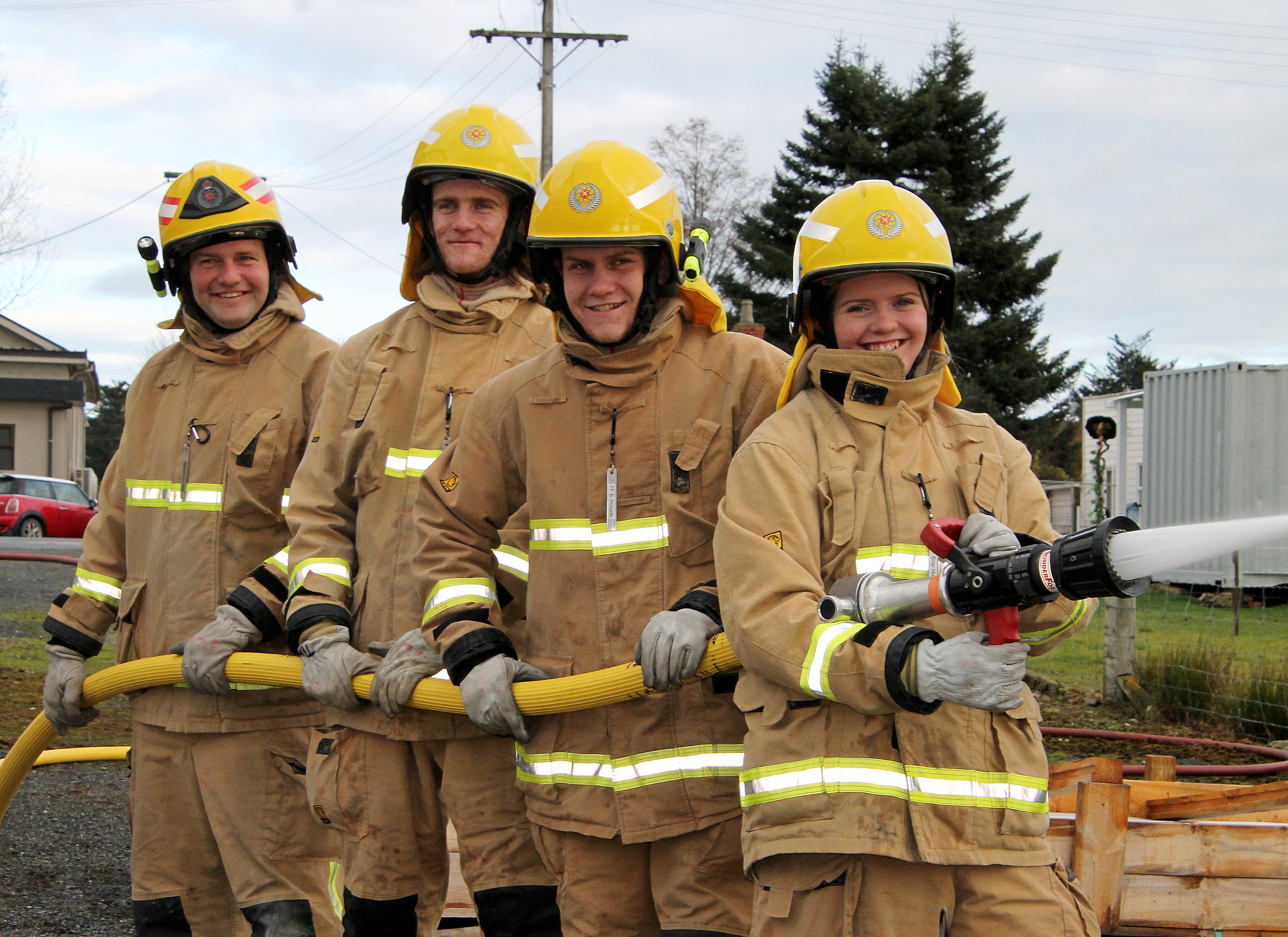 Waitahuna’s firefighting Holgates, (from left) dad Quentin and siblings Crede, 20, Bryn, 19, and...