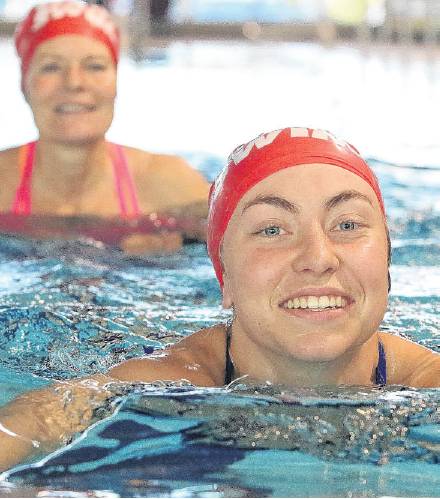 Ruby Beckdahl, 16, leads her friend and fellow MainPower Amberley pool lifeguard, Anne Frankland,...