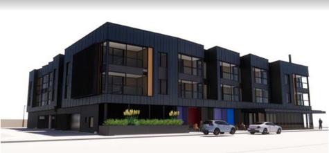 An architect’s drawing of the new building planned for the former Four Square site taken from the...