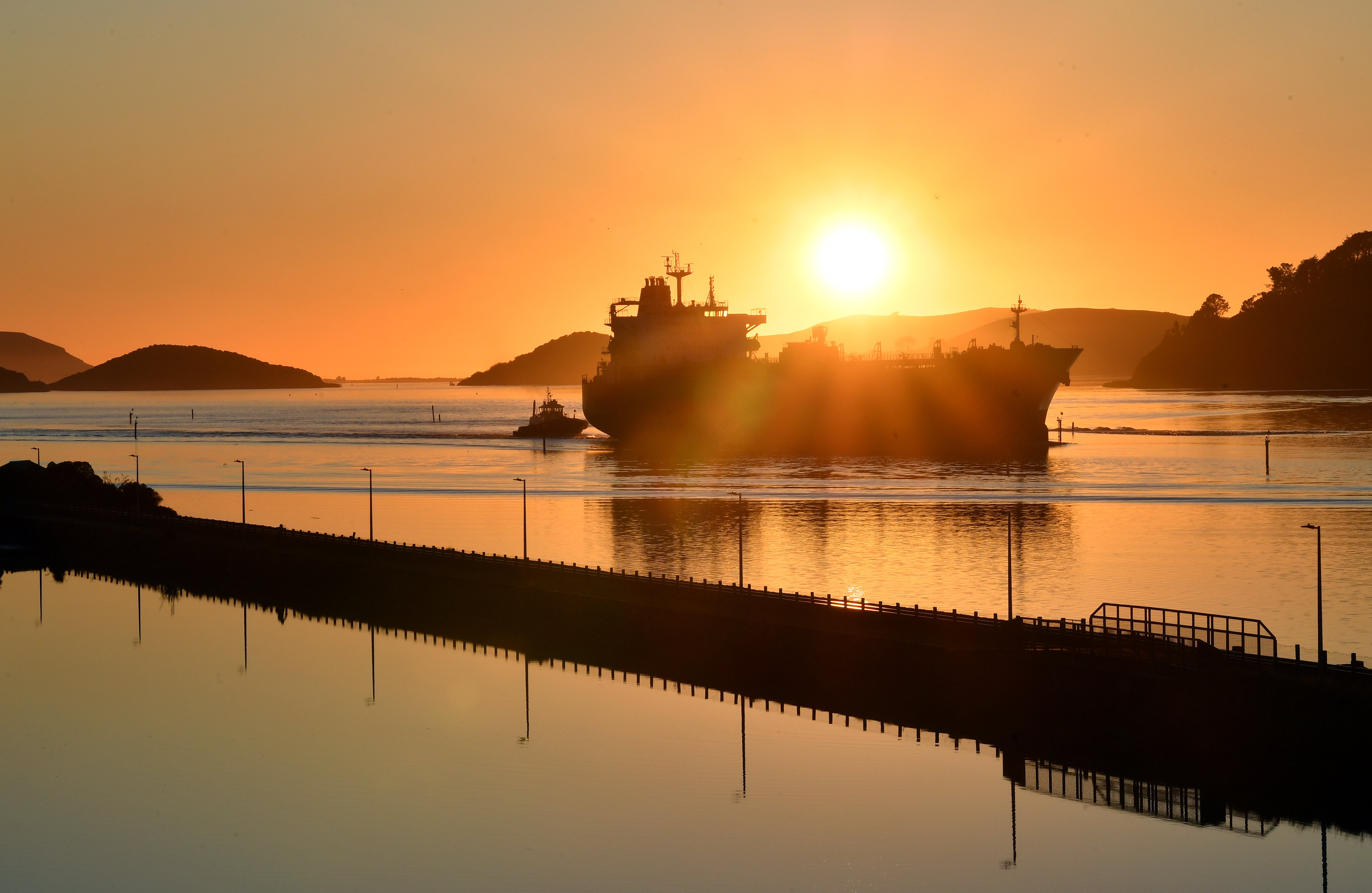 Fuel tanker Nord Vision makes its way up Otago Harbour in calm conditions and under clear skies...