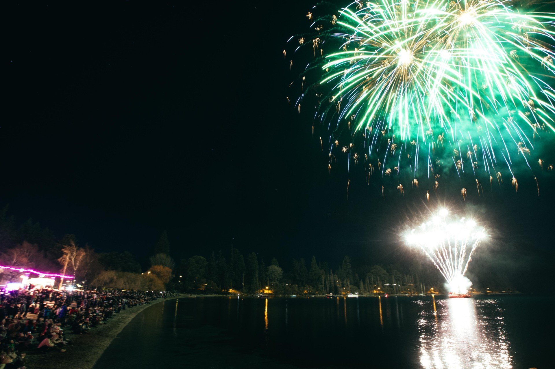 Queenstown’s lakefront is lit up during the town’s annual DFS midwinter fireworks display on...