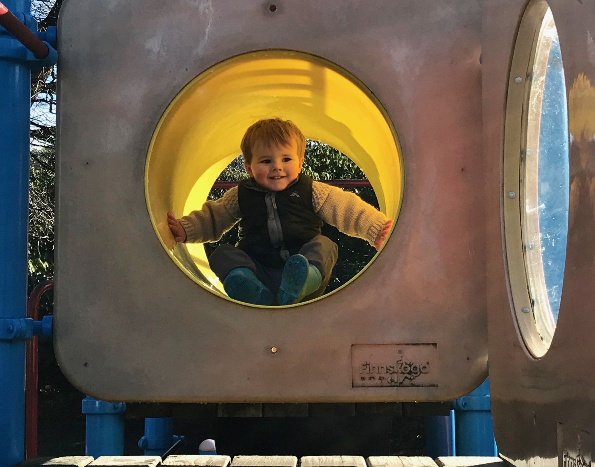 James Russell, 2, of Dunedin, heads out of his favourite tunnel in the Dunedin Botanic Garden...