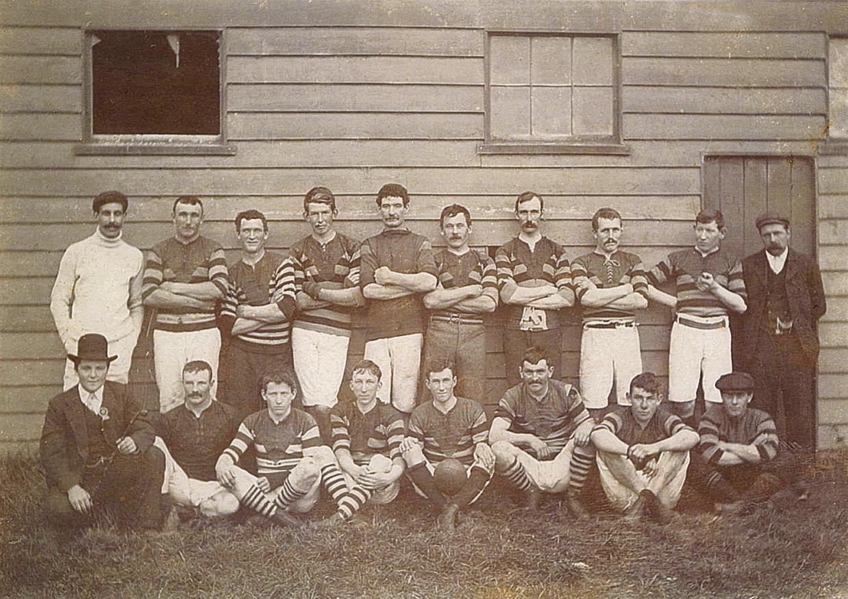 Members of the West Taieri Rugby Club gather outside the old West Taieri Football Pavilion about...