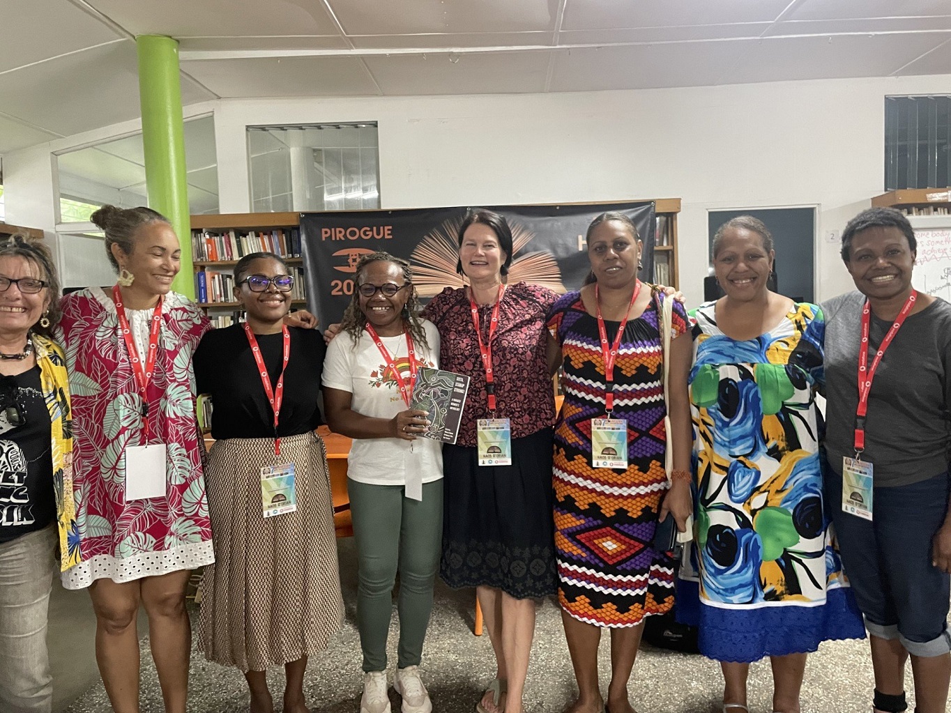 Mikaela Nyman (centre) with co-editor Rebecca Tobo Olul-Hossen (fourth from right) and a bunch of...