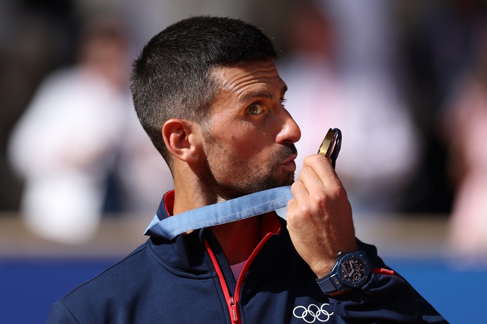 Novak Djokovic celebrates after winning Olympic gold in Paris. Photo: Reuters