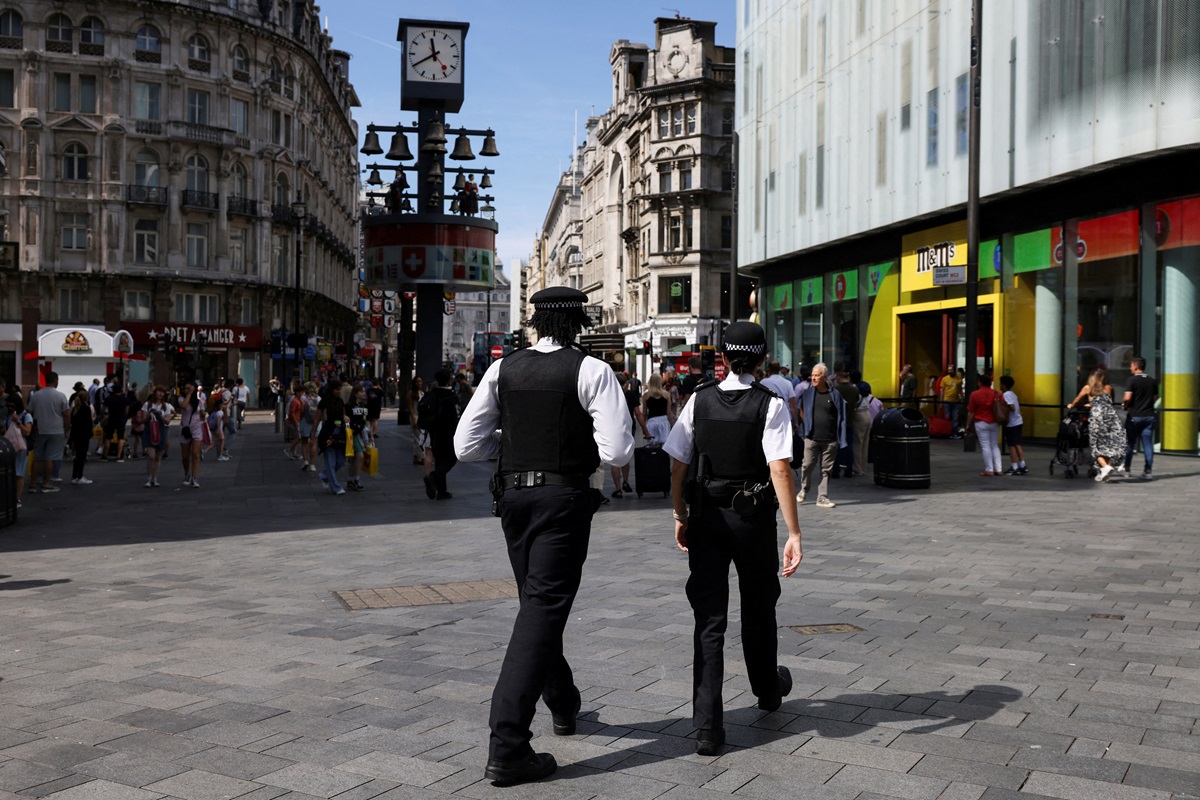 Police officers on patrol in Leicester Square after the stabbing attack. Photo: Reuters