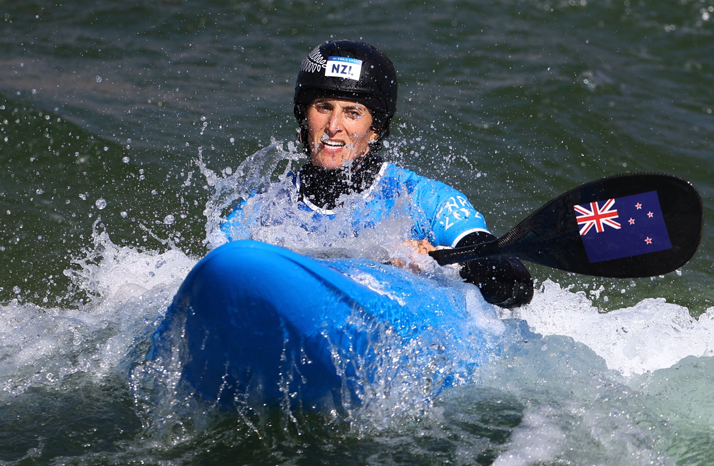 Luuka Jones competes in the Women's Kayak Cross Small Final at Vaires-sur-Marne Nautical Stadium...