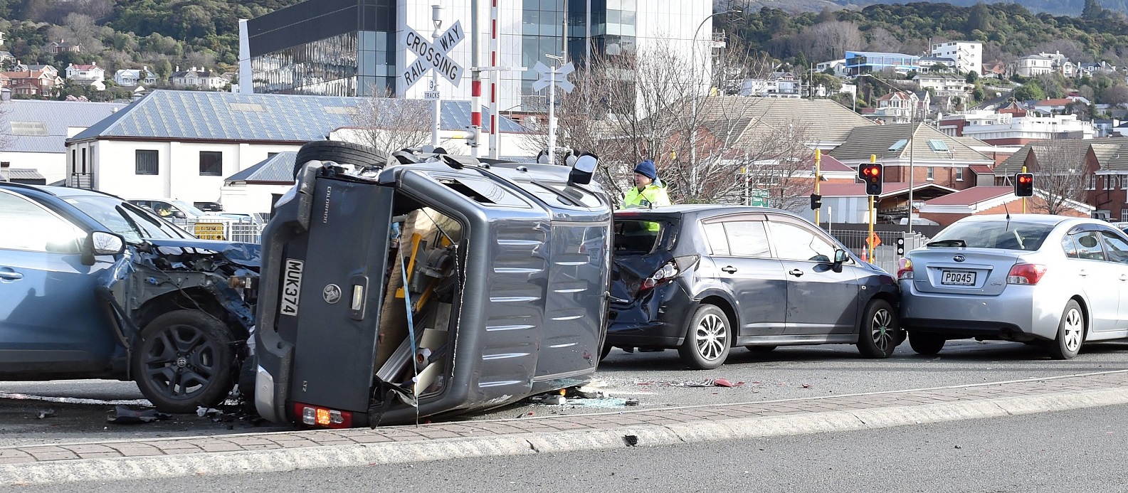 Five cars crashed and one ended up on its side in St Andrew St, Dunedin, yesterday. Photo: Peter...