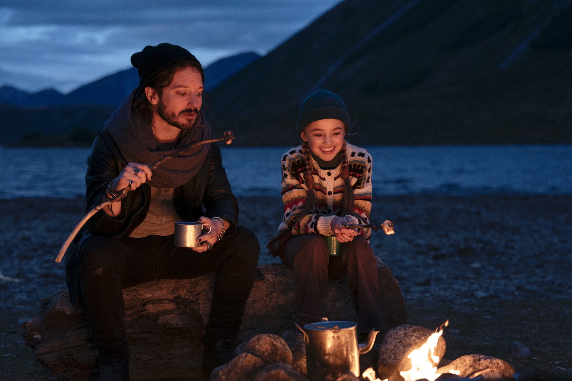 Elijah Wood and Nell Fisher camp while on the hunt for the Canterbury panther.