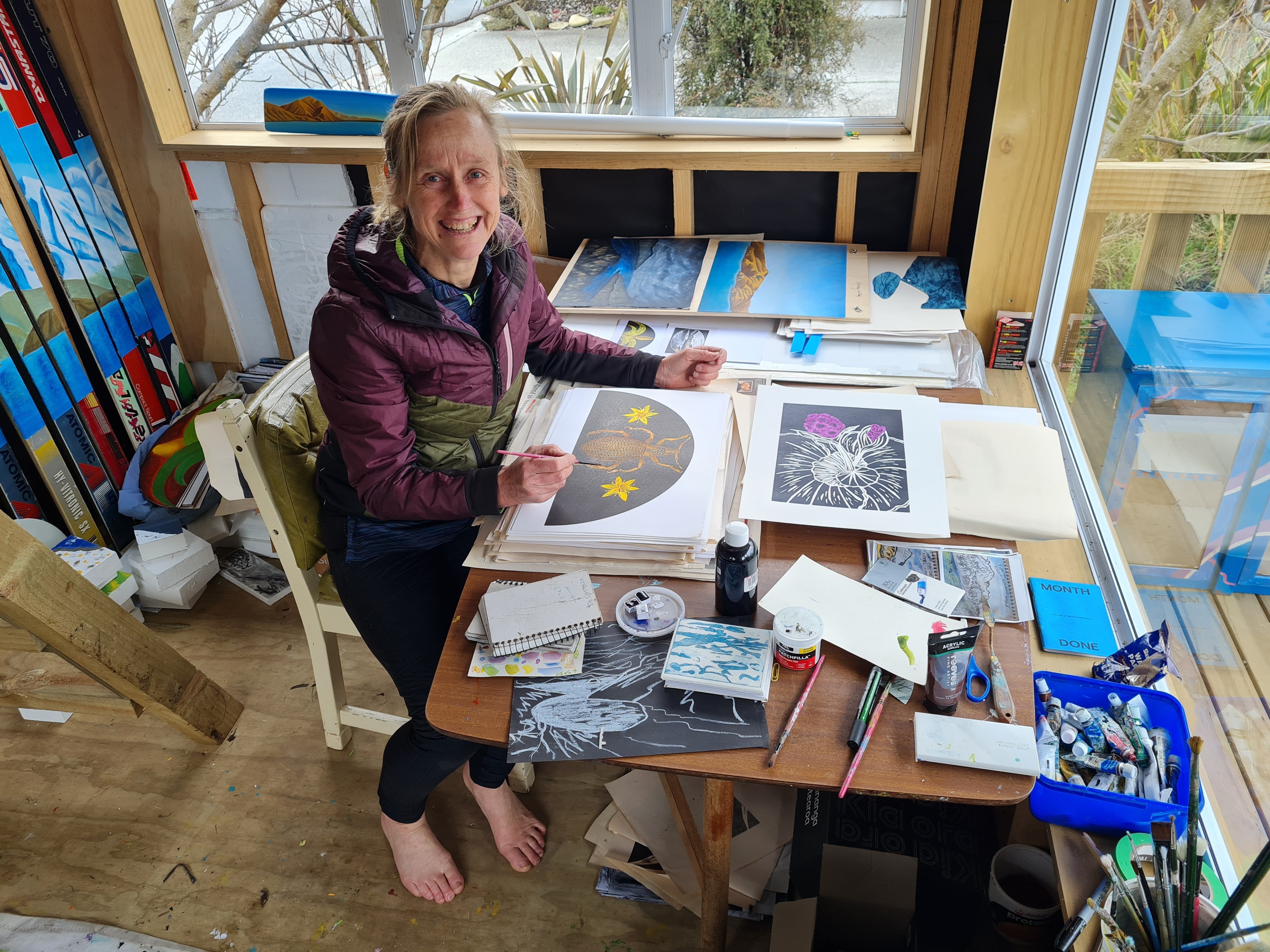 Albert Town artist Chrissy Wickes prepares art for her upcoming talk and exhibition on the...