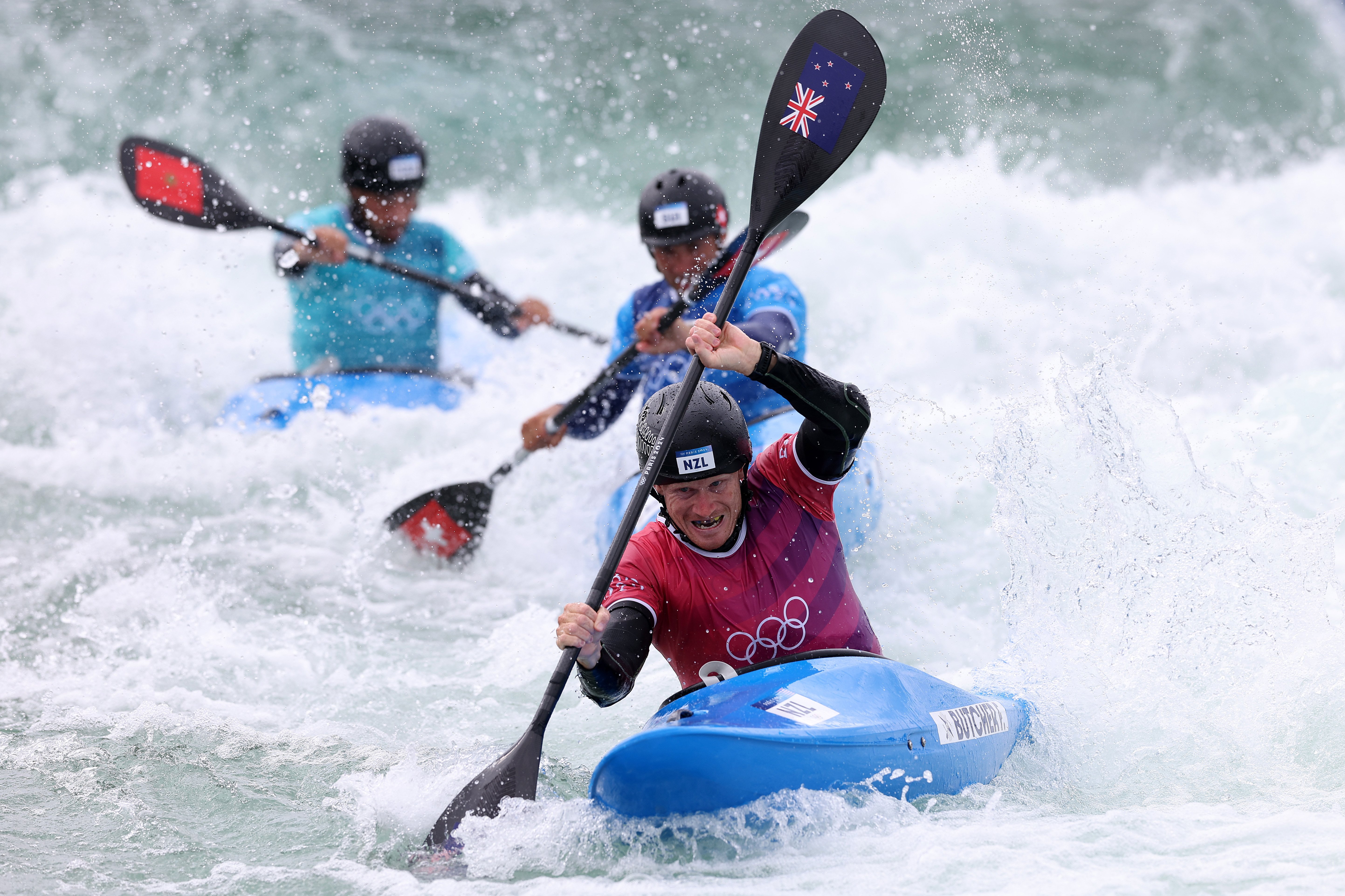 Finn Butcher competes in the first round of the kayak cross in Paris yesterday. PHOTO: GETTY IMAGES