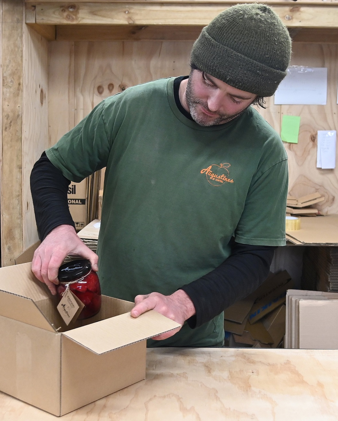 Gus Hayden’s new logistics shed gives him space to label his Augustine’s of Central preserves....