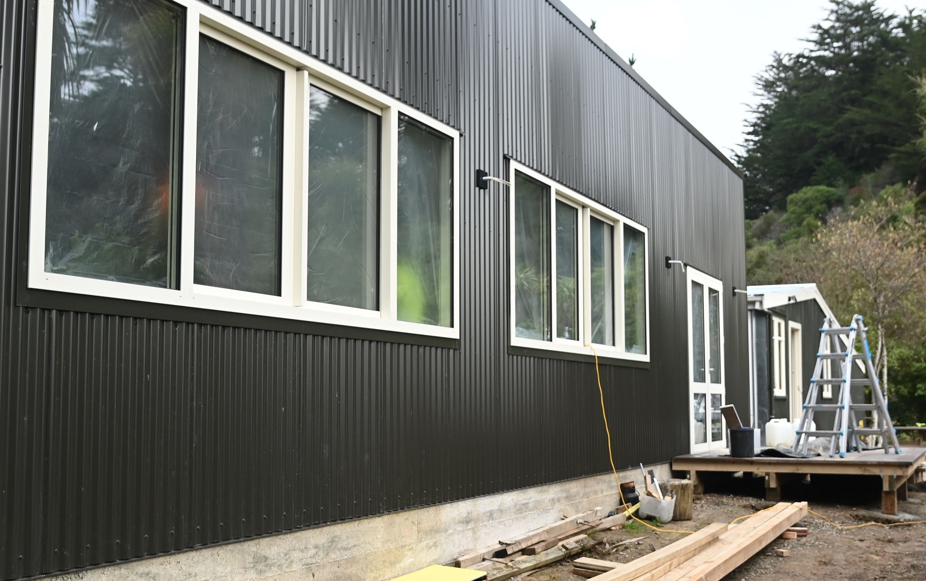 The new "up-specked" shed that houses Hayden’s first custom-built kitchen is nearly complete....