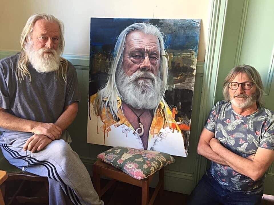 Stig Eldred with artist Gwyn Hughes’ winning portrait of him. It received the people’s choice...