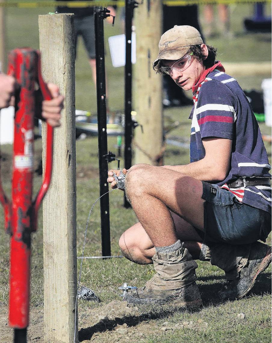 Will Hassall, of Rangiora High School, makes sure his line is tight and straight as he competes...