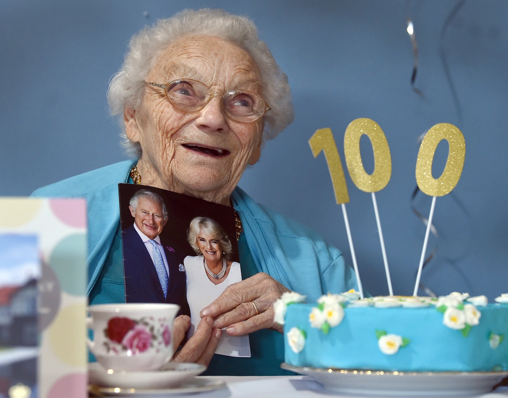 Dunedin woman Irene Chapman, nee Hanson, holds a card from King Charles marking her 100th...