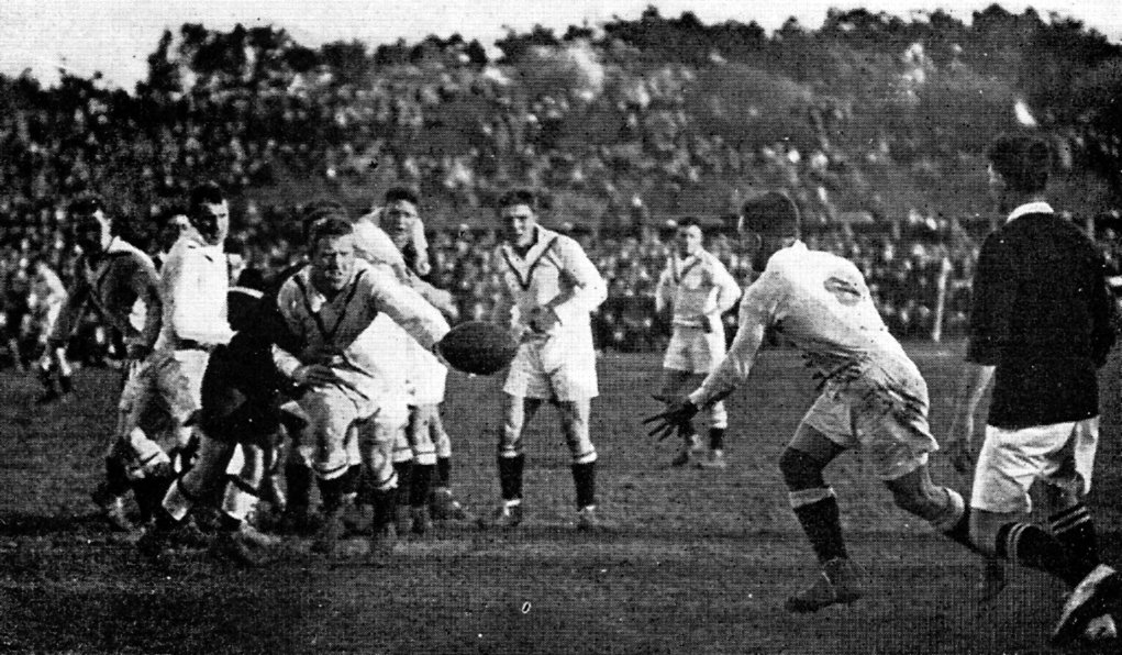 An English player offloads during the rugby league test against the Kiwis in 1924 while...