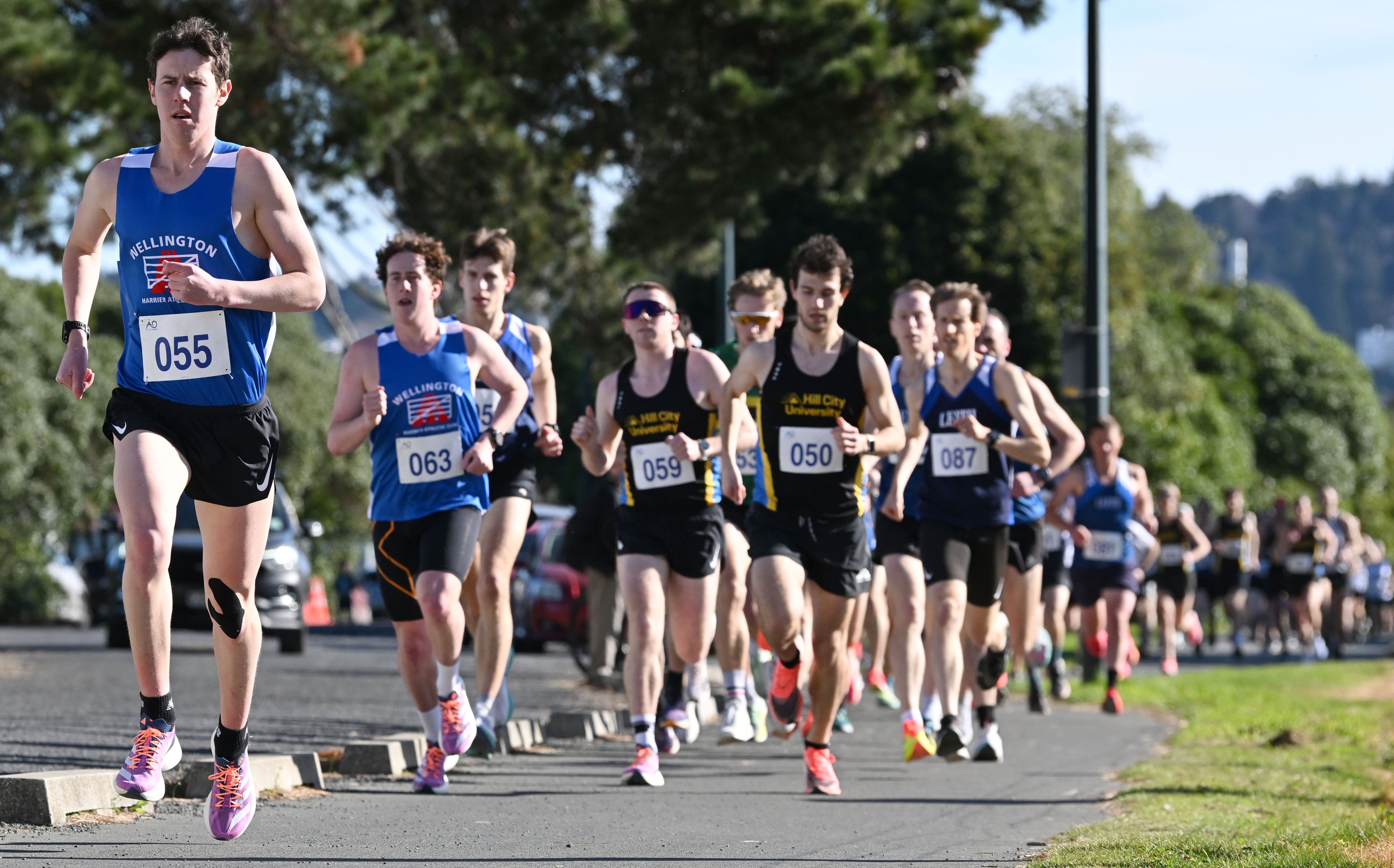 Liam Chesney leads from the start on his way to win the senior men's 5km race in the Otago road...