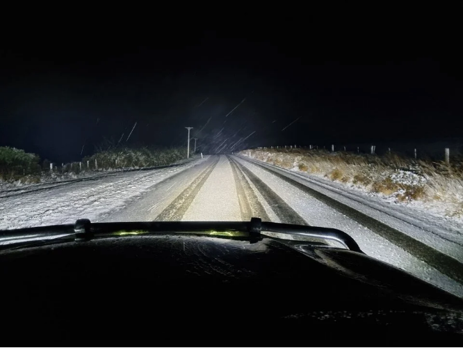 Snow on State Highway 93 early this morning. The highway is now closed to all traffic. Photo:...