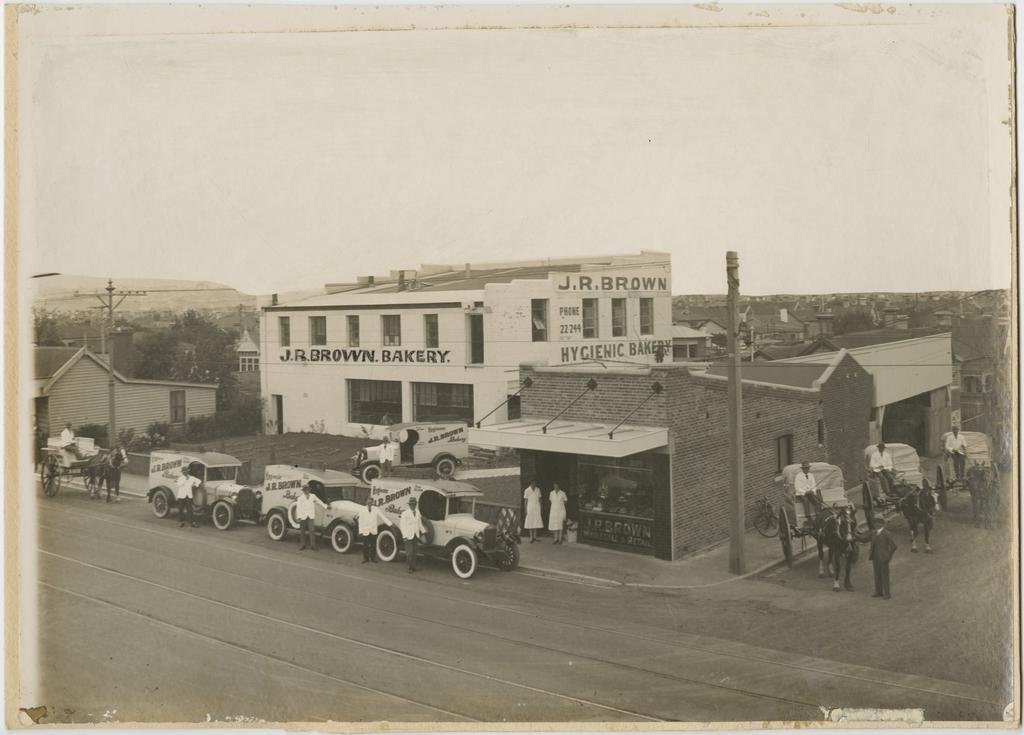 A photograph from about 1929 showing delivery staff outside J.R Brown’s Bakery in Hillside Rd...