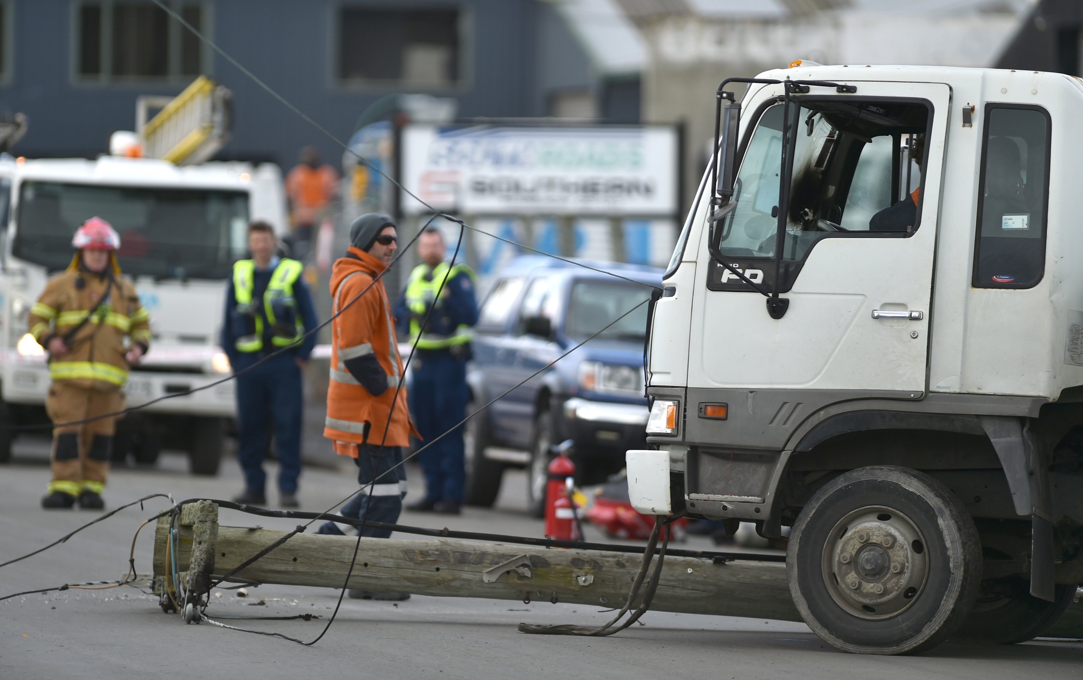 A truck was covered in power lines after crashing into a pole yesterday. Photo: Gregor Richardson