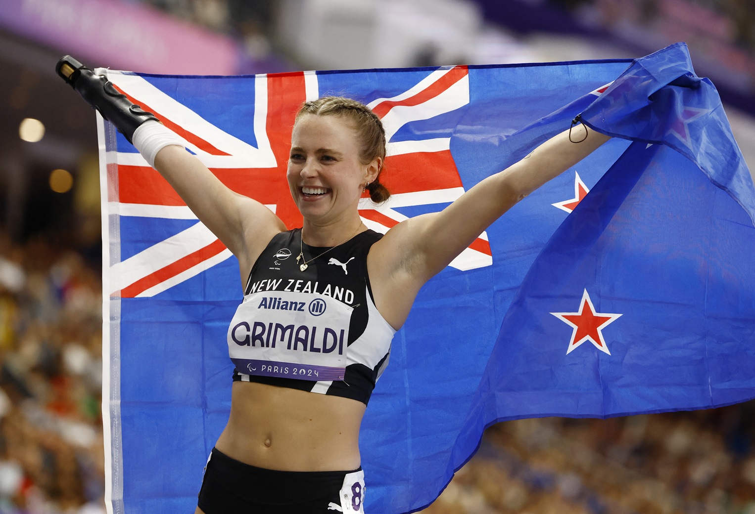 Anna Grimaldi celebrates after her bronze medal win in Paris. Photo: Reuters