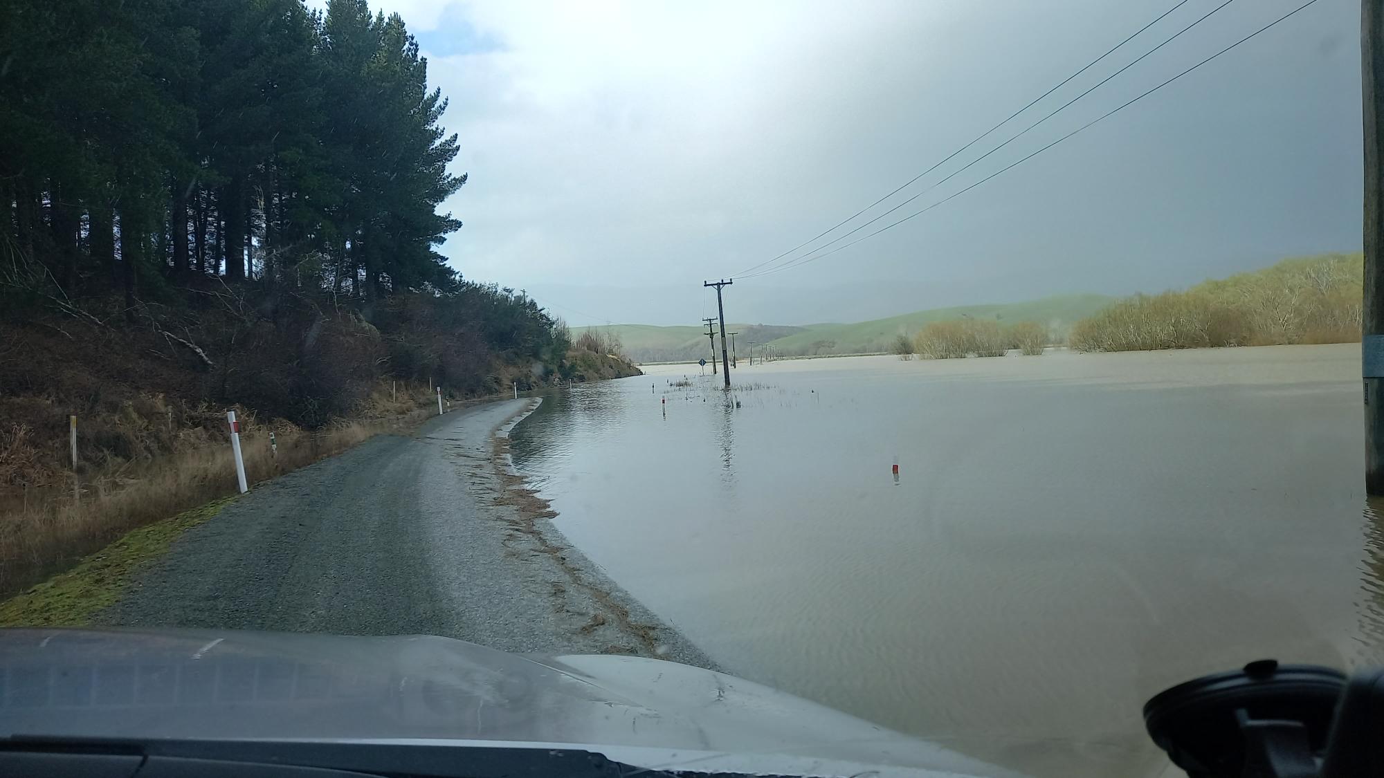 Flooding on Piano Flat Rd just north of Waikaia township yesterday. Photo: Southland District...