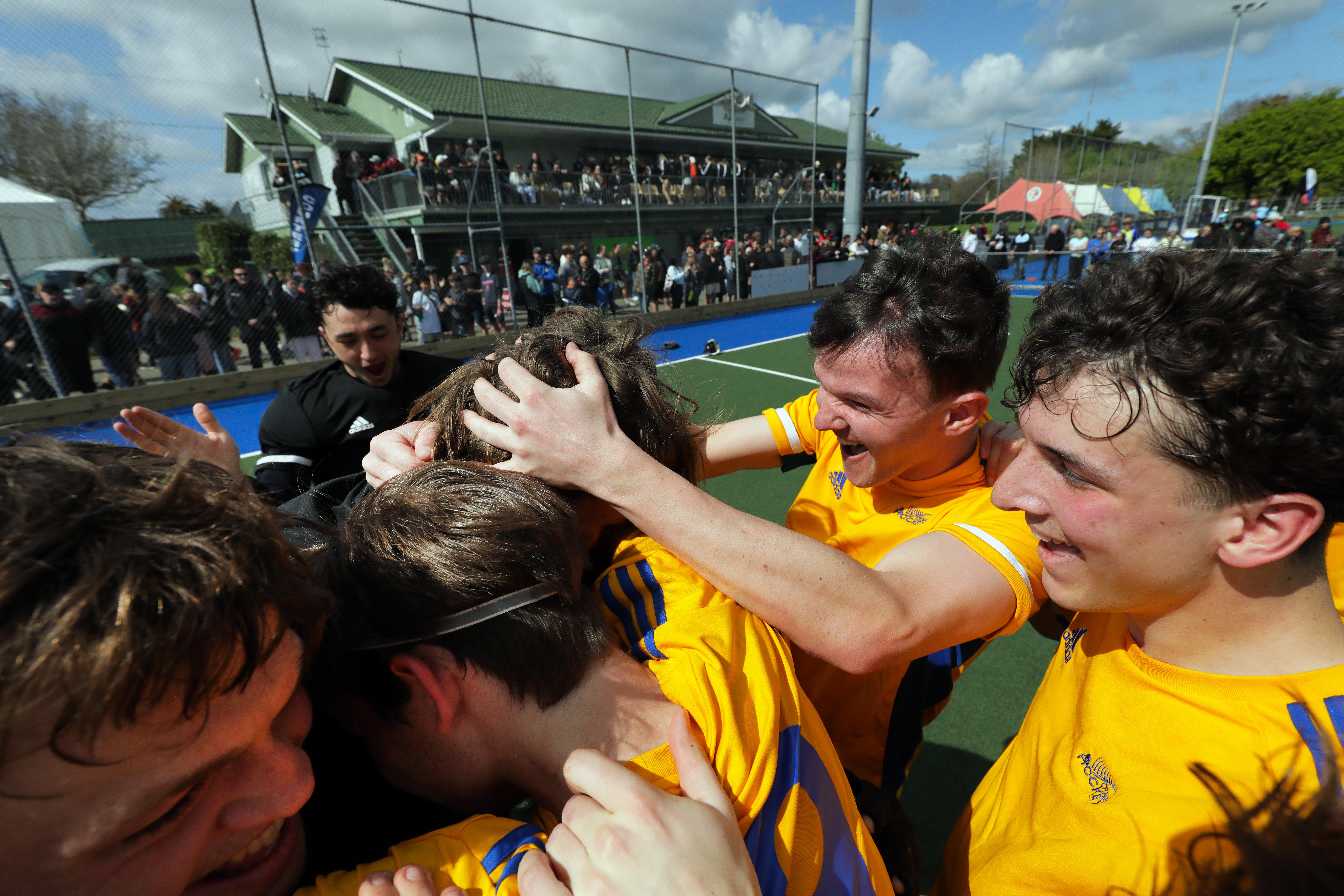 Otago players celebrate clinching bronze at the national hockey championships in Palmerston North...