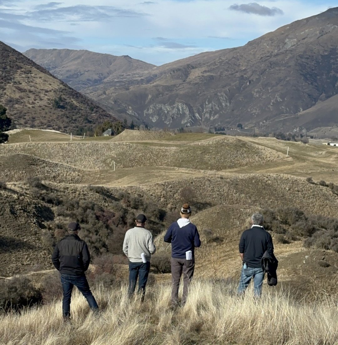 Looking over the proposed new Hogan Gully golf course earlier this year are (from left) course...