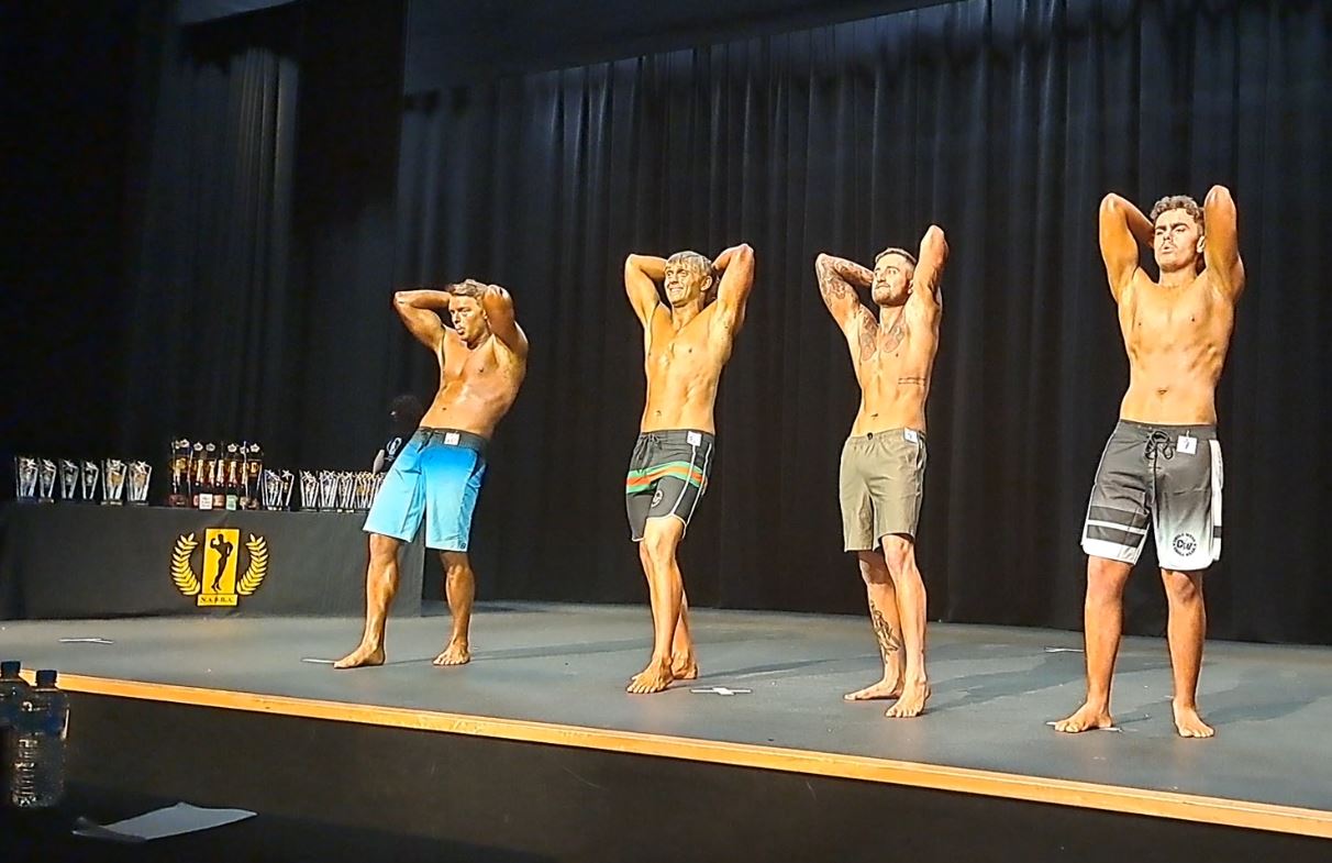 Lucas Russell (third from left) competes in the Novice Mr Body Board Shorts category, at National...