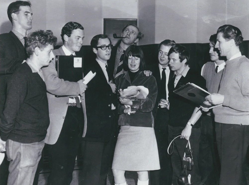 The cast of The Cambridge Circus in an NZBC radio studio during their 1964 tour. Producer Peter...