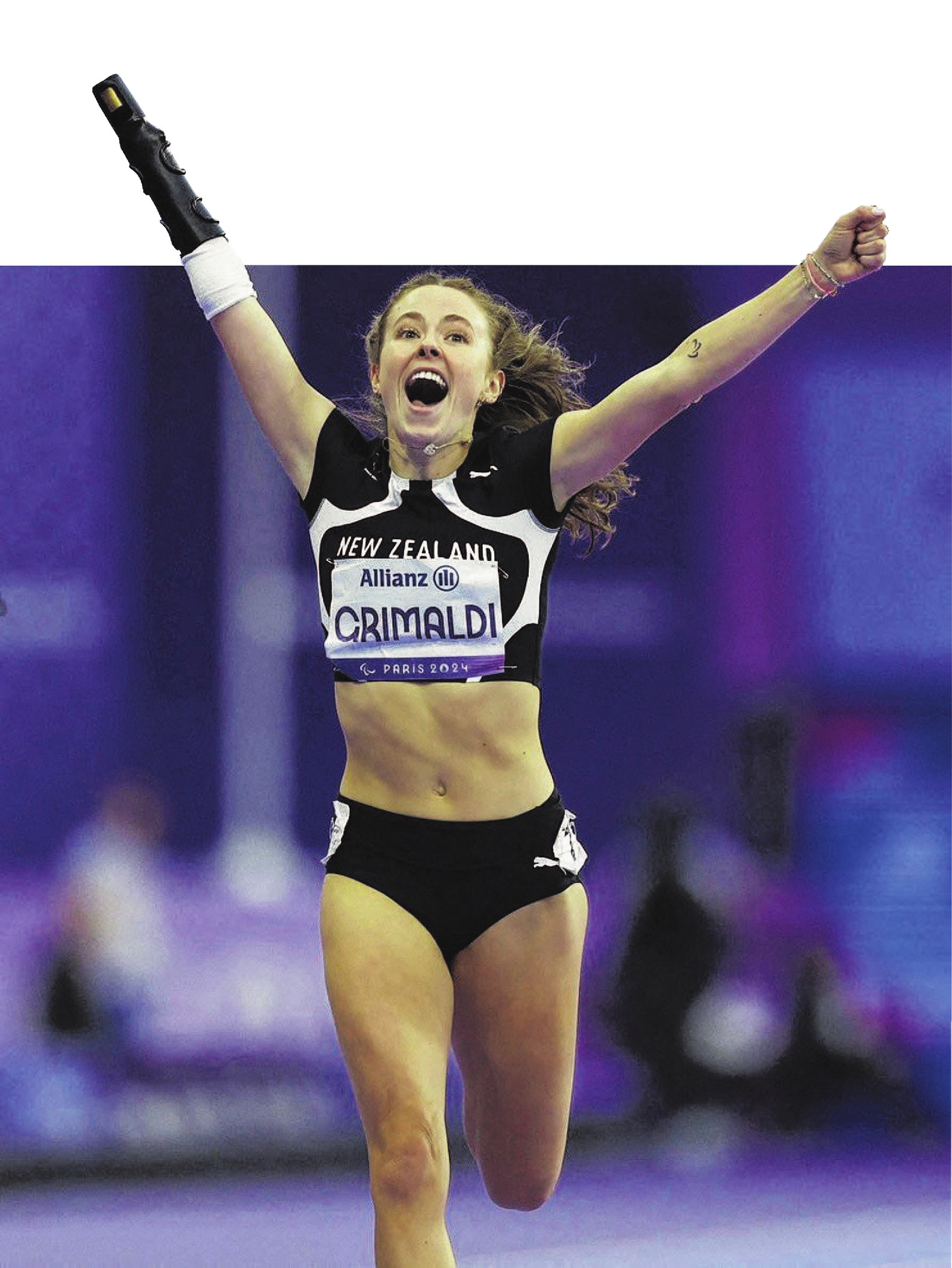 Dunedin athlete Anna Grimaldi celebrates winning the women’s T47 200m at the Paralympics in Paris...