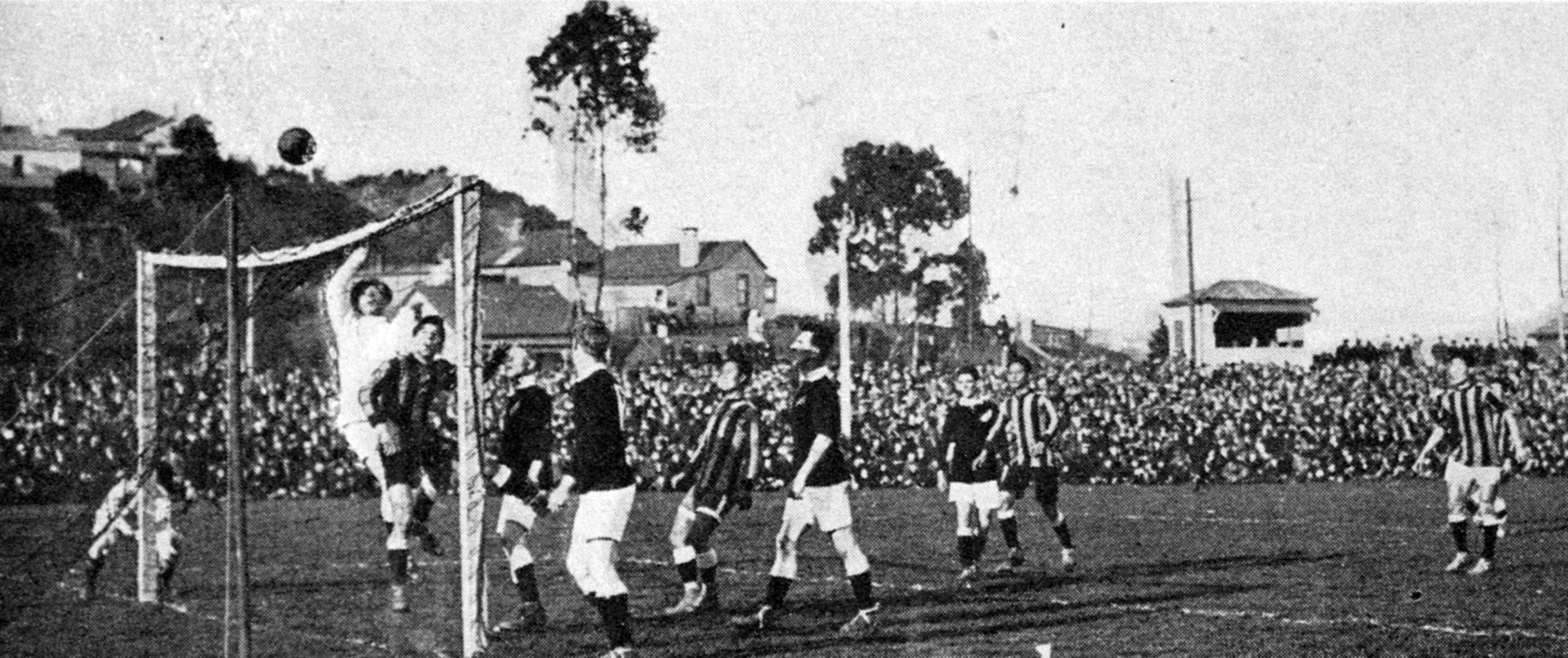 A corner kick by Ting, of the combined Chinese universities team, bounces off the crossbar in the...