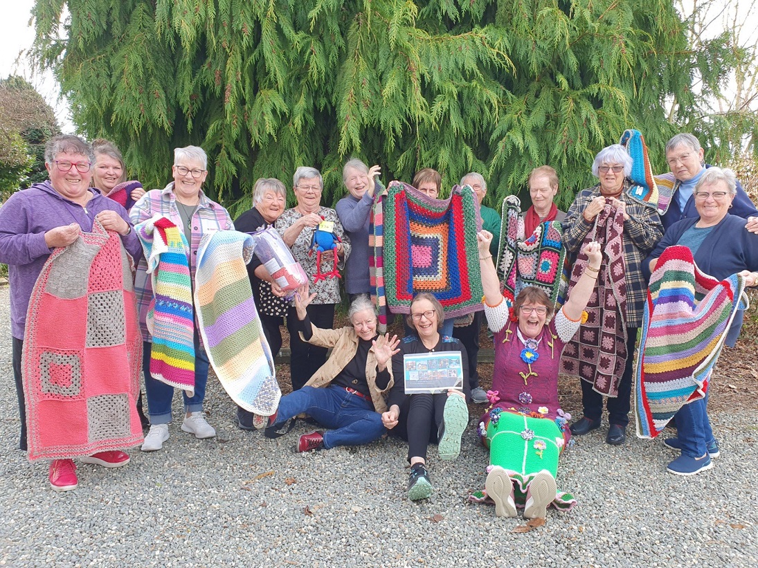 The Nattering Knitters celebrate the fundraiser. Photo: Gerrit Doppenberg